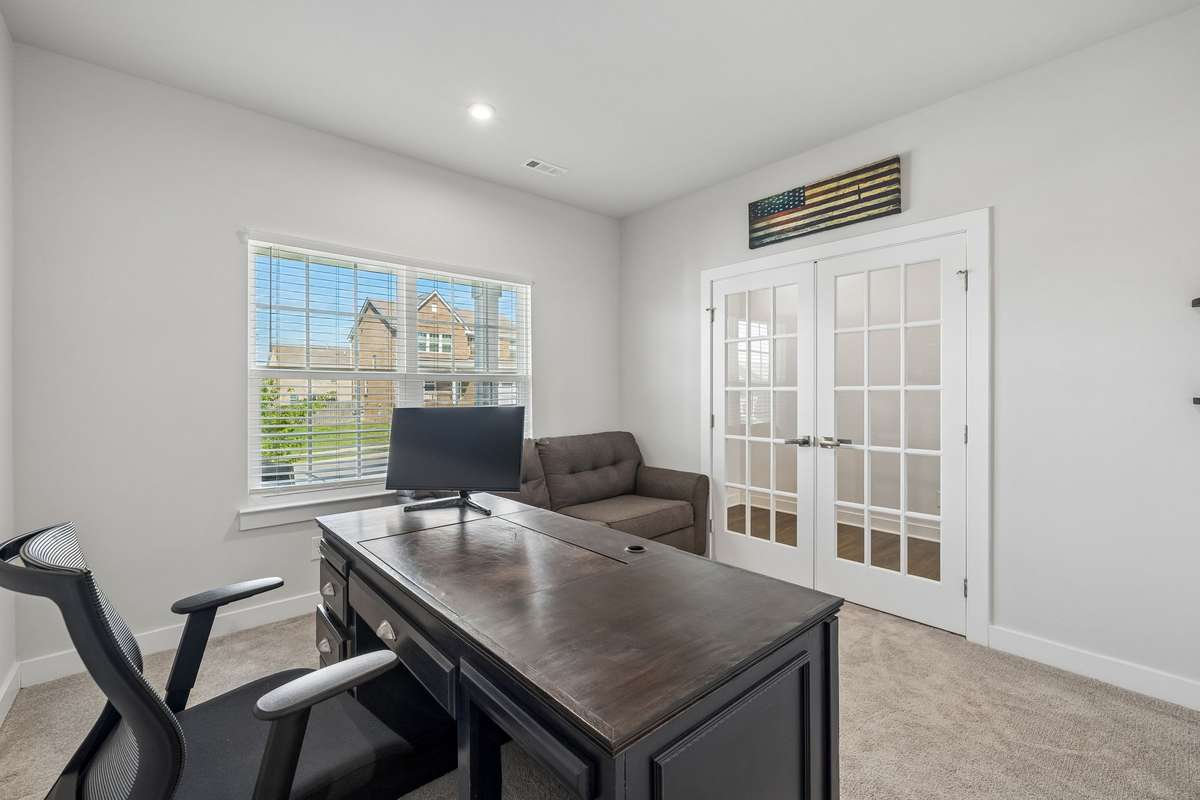 Plenty of room for a desk, seating, bookshelves, and more.