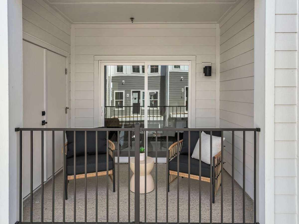 Private covered deck off of the primary bedroom is the perfect spot to relax. *photos are of a similar floor plan with differing finishes and are for representational purposes only*