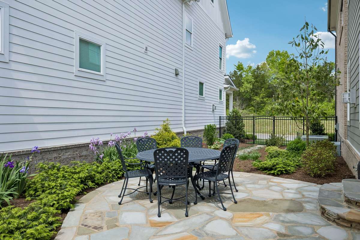 Detailed landscaping within metal fencing