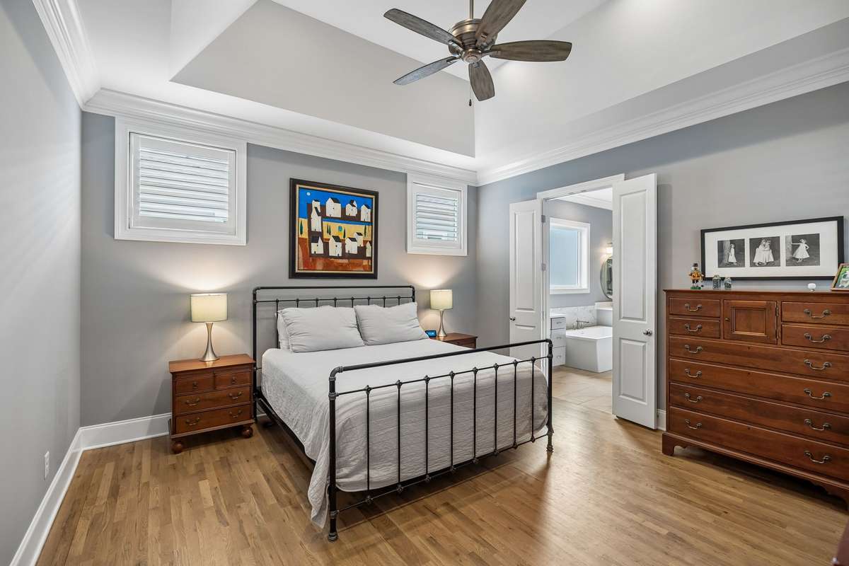 Well-appointed first-floor primary suite with ample space and comfort