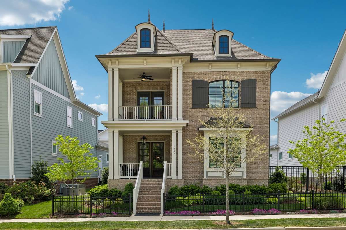 Two covered front porches welcome family and friends.