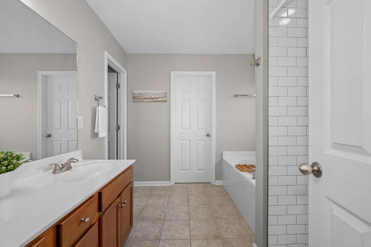 Primary bath with double vanities.