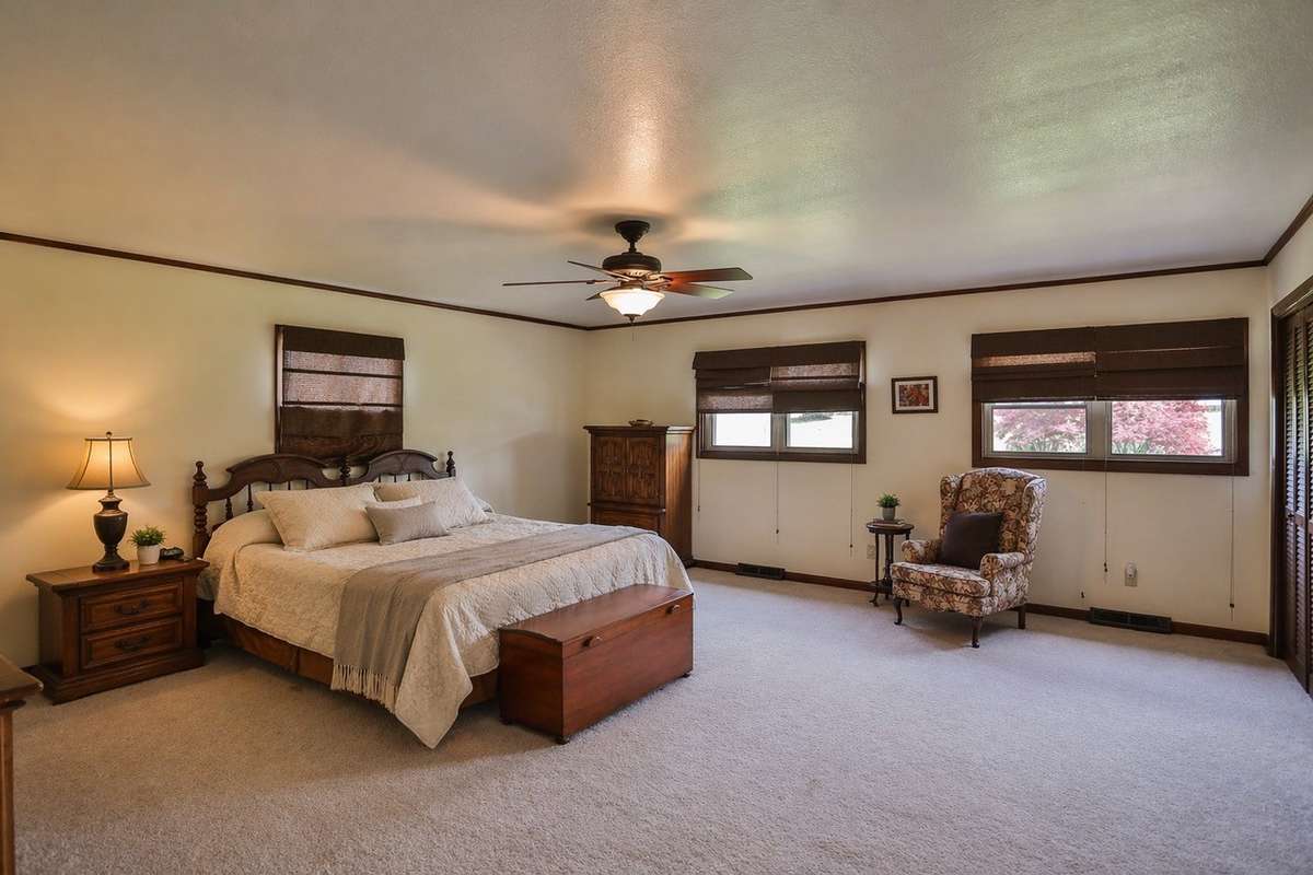 Virtually staged bedroom being used as primary bedroom.