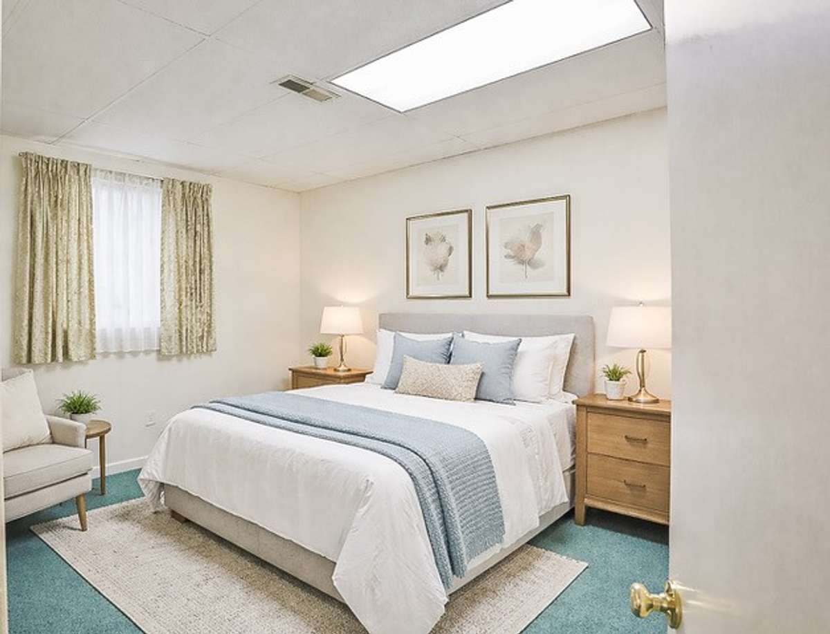 Virtually staged.  This room is a full size bedroom but is full of moving items at the moment.