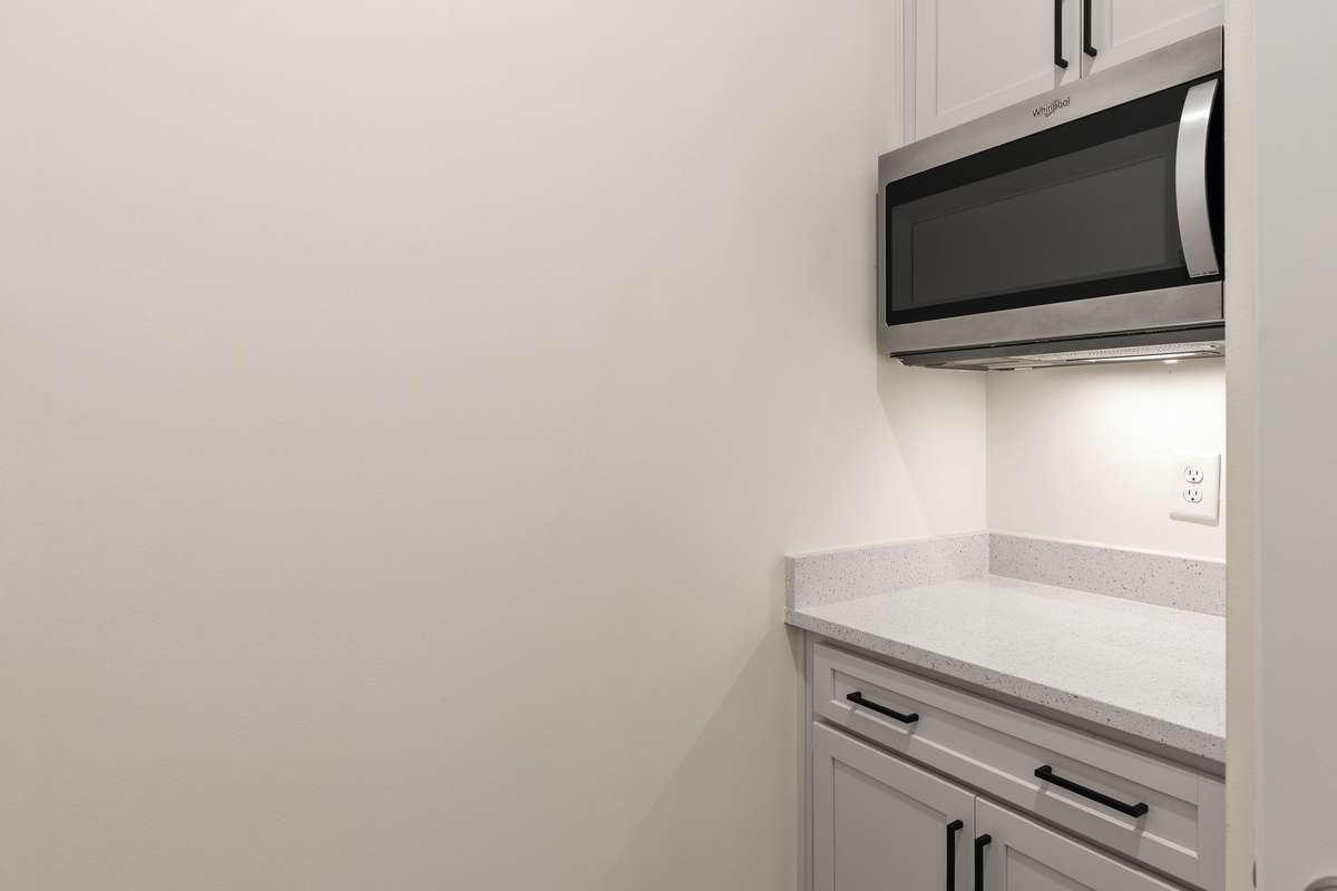 Perfect space for a coffee bar located in the kitchen pantry.