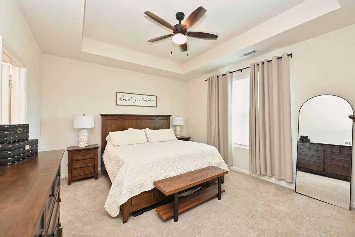 Quiet master retreat on rear of home with walk in closet