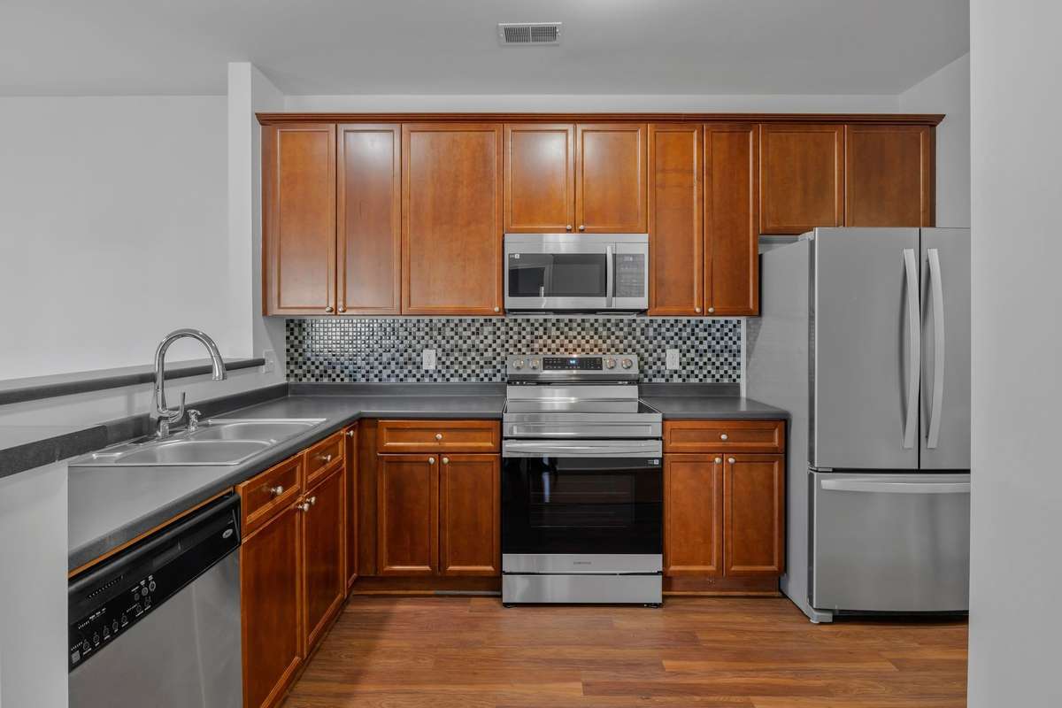 New drop-in oven, refrigerator and washer/dryer remain