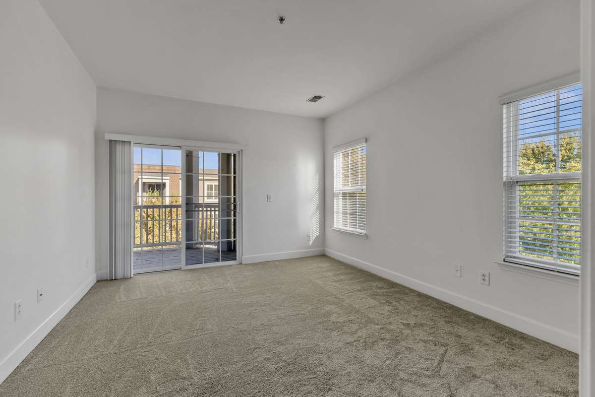Primary bedroom has access to the private balcony