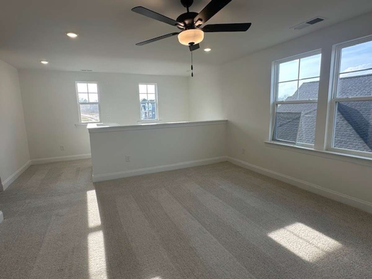 Upstairs Bonus Room area can be the central hang out location for game night, movie night and so many other fun activities!