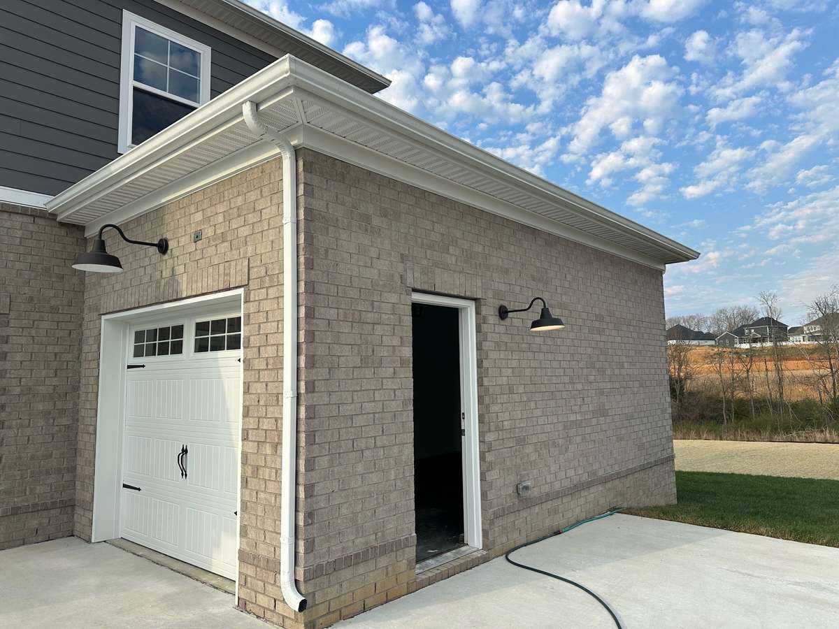 The 3rd car "carriage" garage bay is great for storage, and all kinds of extras!"