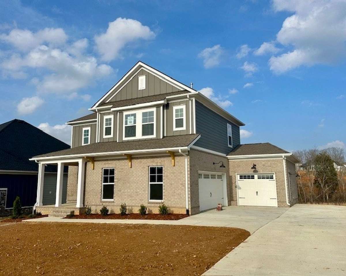 Check out the 3rd garage bay! A perfect area for storage, lawn mower, and all your big toys!
