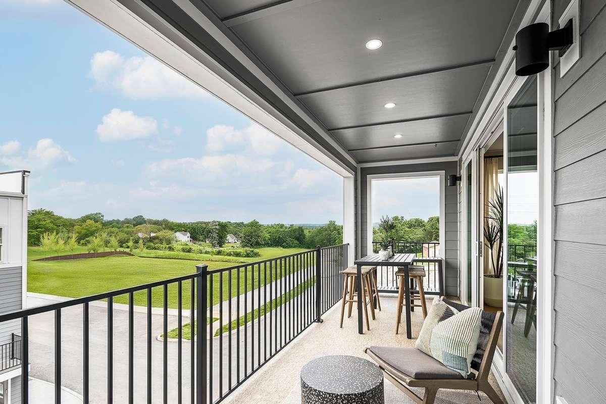 Covered Deck off the main living space *Photos are of a similar floor plan with different finishes and are for representational purposes only*