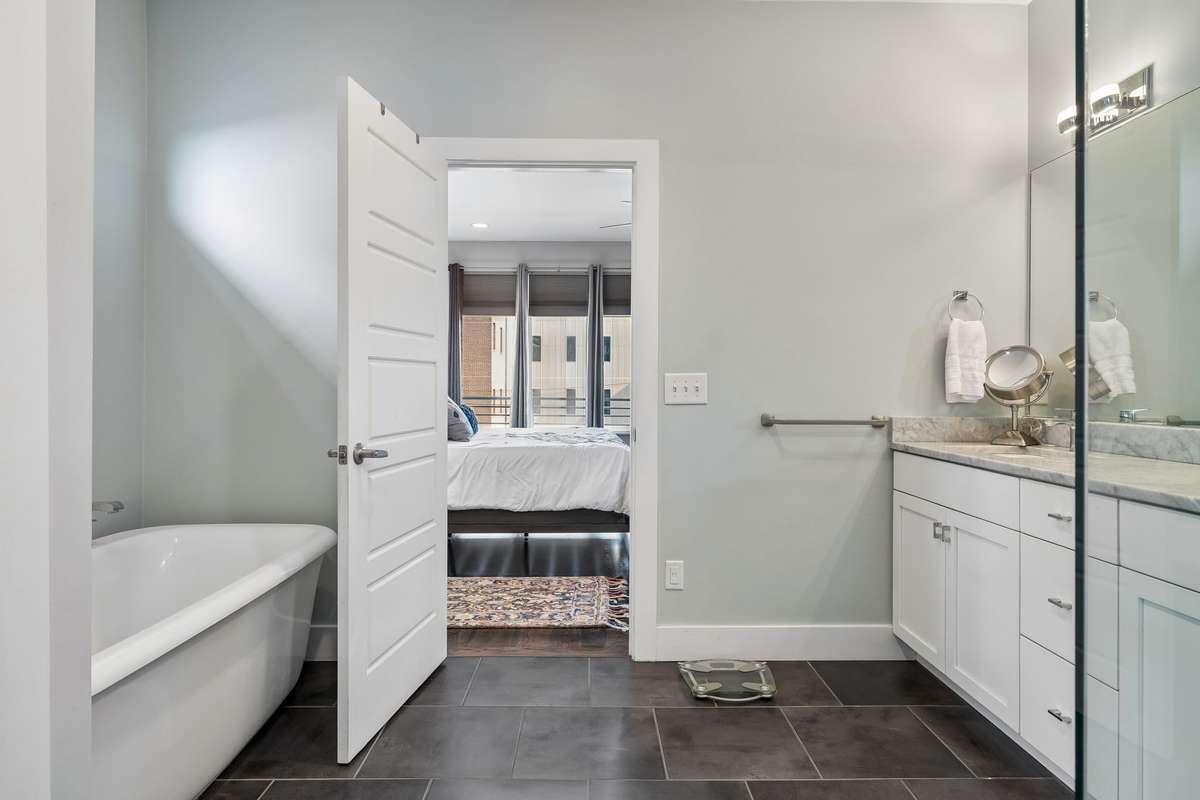 A large separate soaking tub to complement this spacious primary bath!