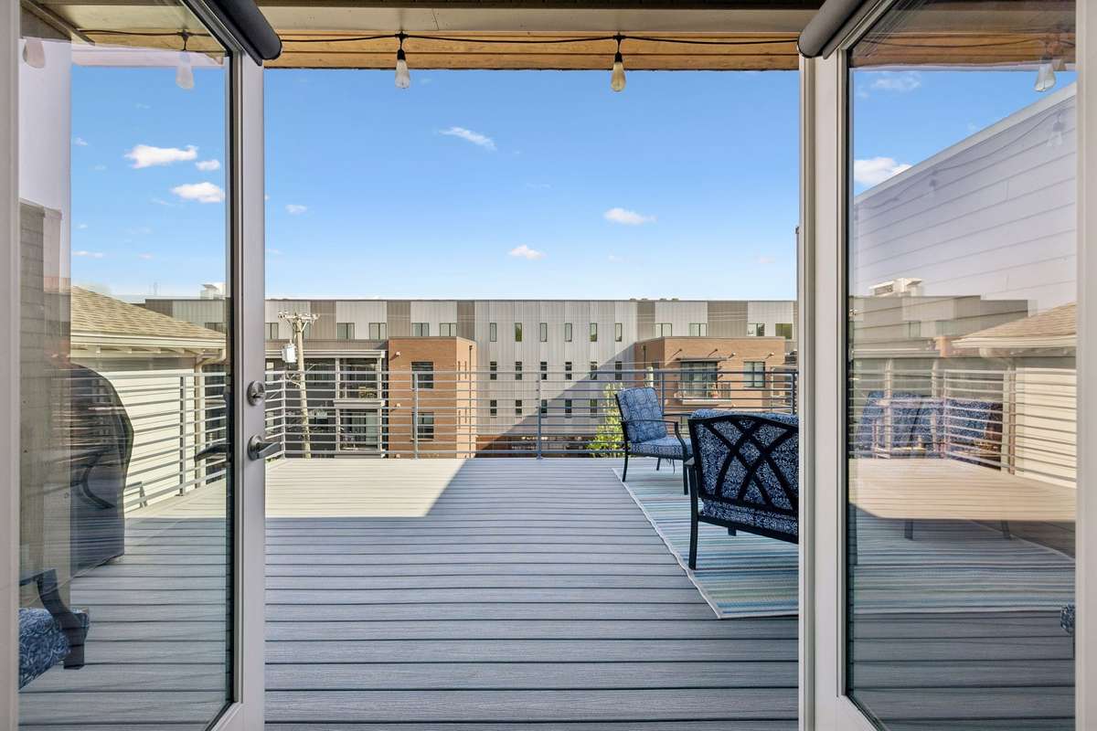 Step outside to a generously sized rooftop deck!