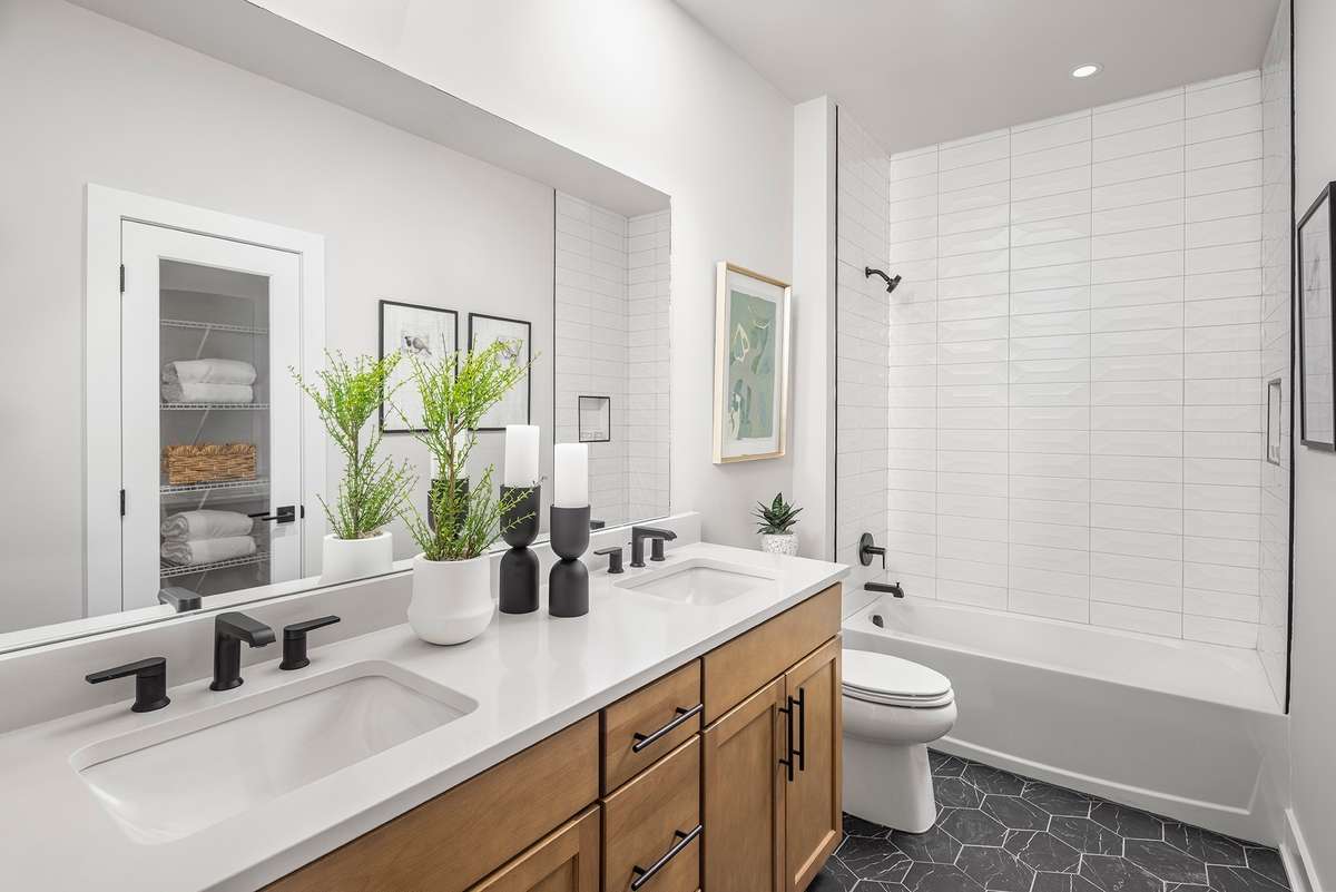 Shared hall bath *Photos are of a similar floorplan with differing finishes*