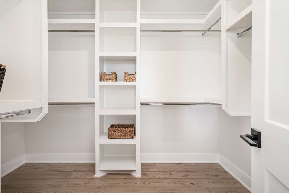 This closet offers a practical and organized storage space designed to keep clothing and essentials neatly arranged.*Photos are of a similar floorplan with differing finishes.*