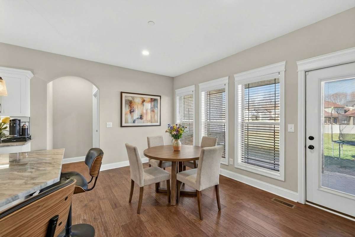 The breakfast nook has been virtually staged.