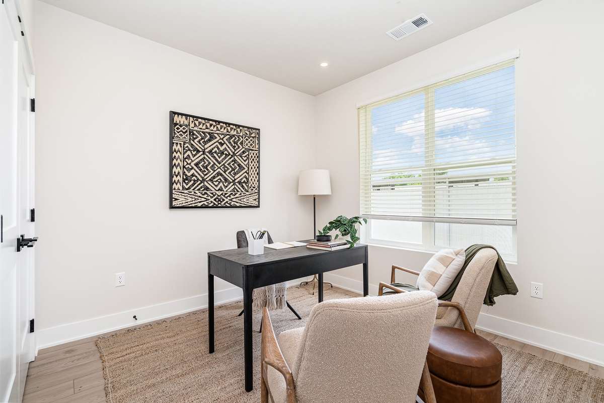 A well‑placed window brings in natural light, creating a bright environment that’s perfect for focused work or quiet relaxation.*Photos are of a similar floorplan with differing finishes.*