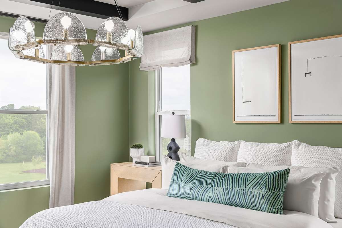 With its balance of openness and tranquility, this primary bedroom serves as a peaceful sanctuary within the home.*Photos are of a similar floorplan with differing finishes*
