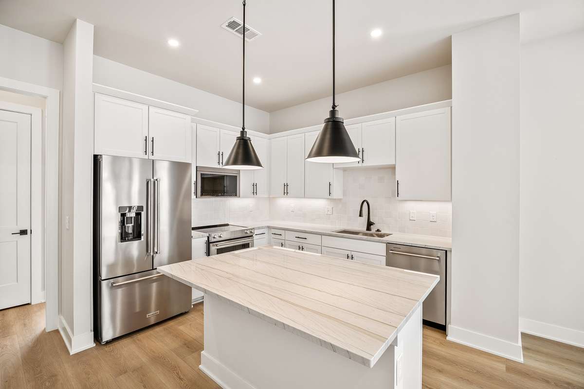Welcome to 342 Hutcherson Aly! This 4-bedroom, 4-bathroom townhome features an open-concept kitchen, upgraded Kitchenaid appliances and stylish design selections.