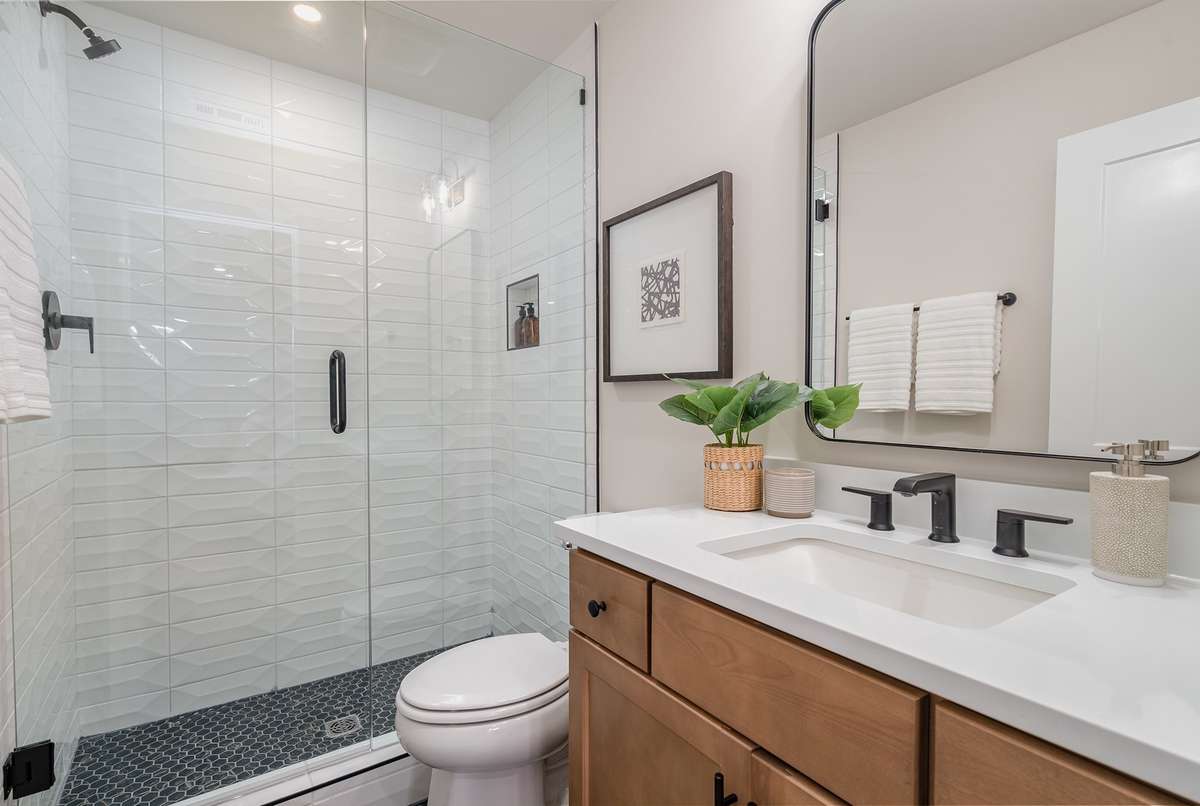 First floor bath  *Photos are for representational purposes only and are of a similar floor plan with differing finishes*