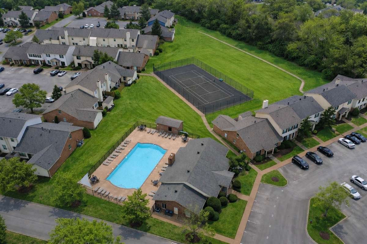 The neighborhood pool, clubhouse, and tennis court are just right down the street from this property.