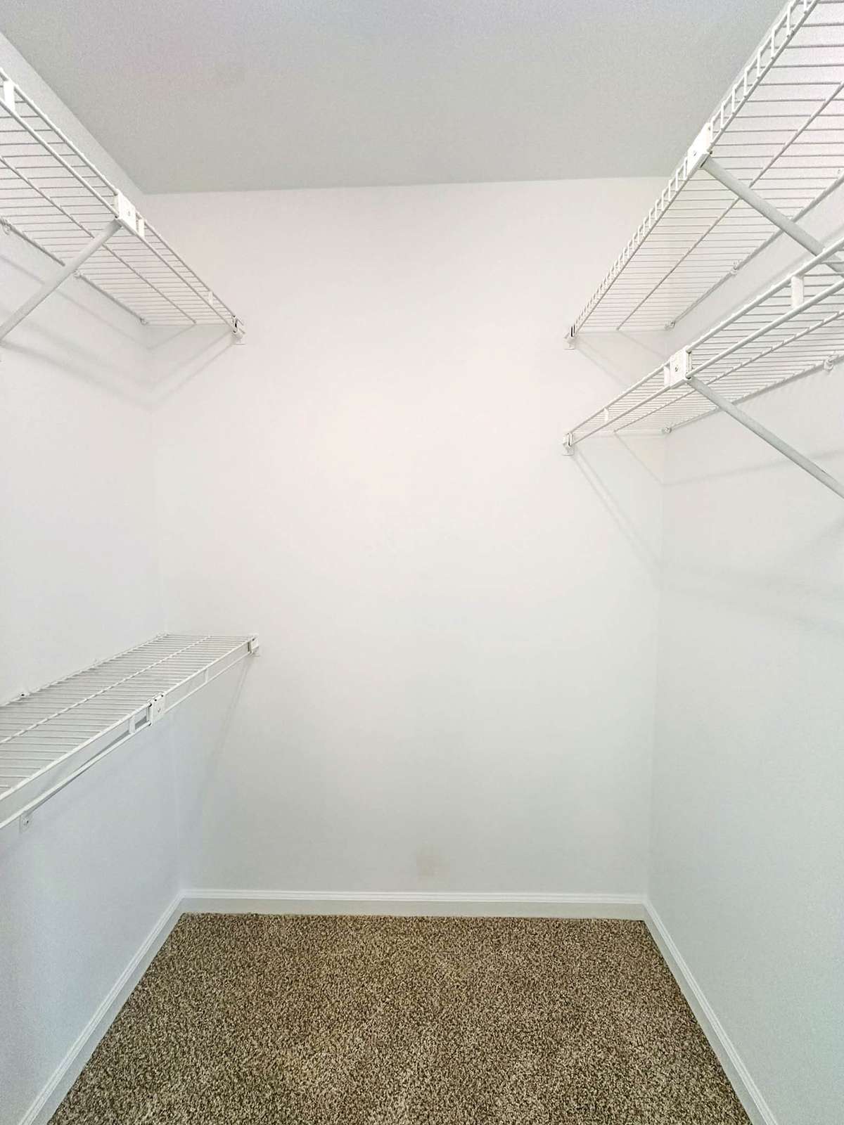 Spacious walk-in closet off the primary bedroom.