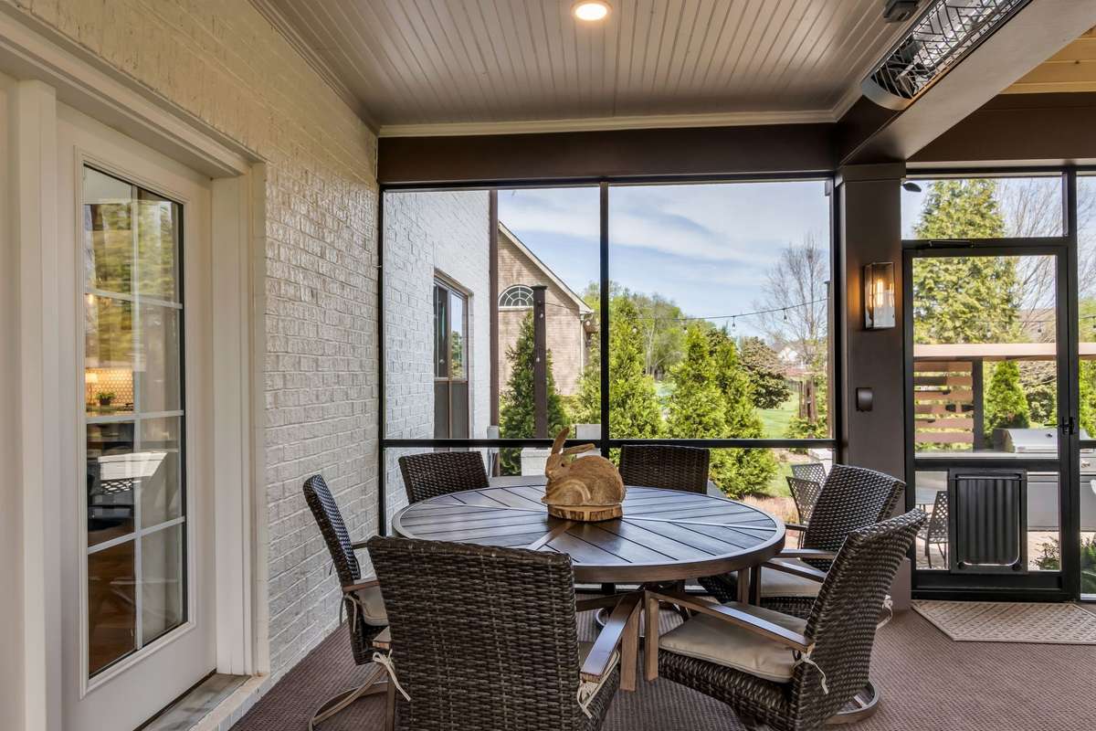Perfect for entertaining, this space provides plenty of seating. Eat inside or outside. The outdoor kitchen in just steps away.