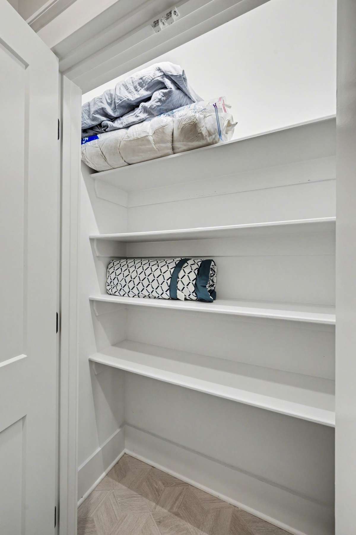 Linen closet in bathroom