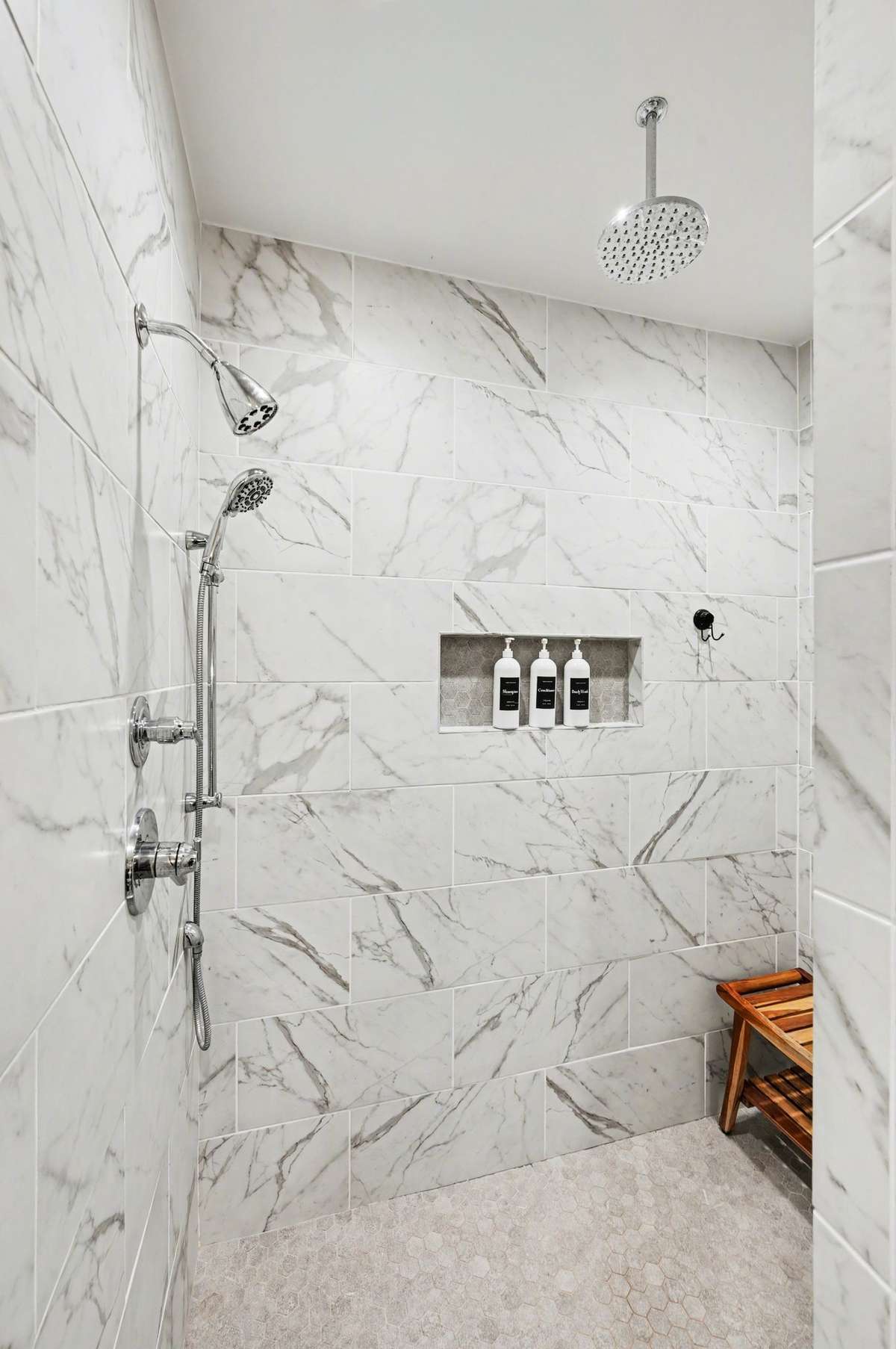 Large shower with bench and notched out storage