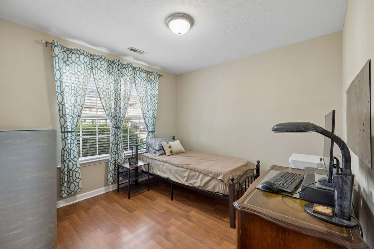 Second bedroom with double window & neutral color scheme. 2739 Oxford Hall Ave. Murfreesboro, TN 37128
