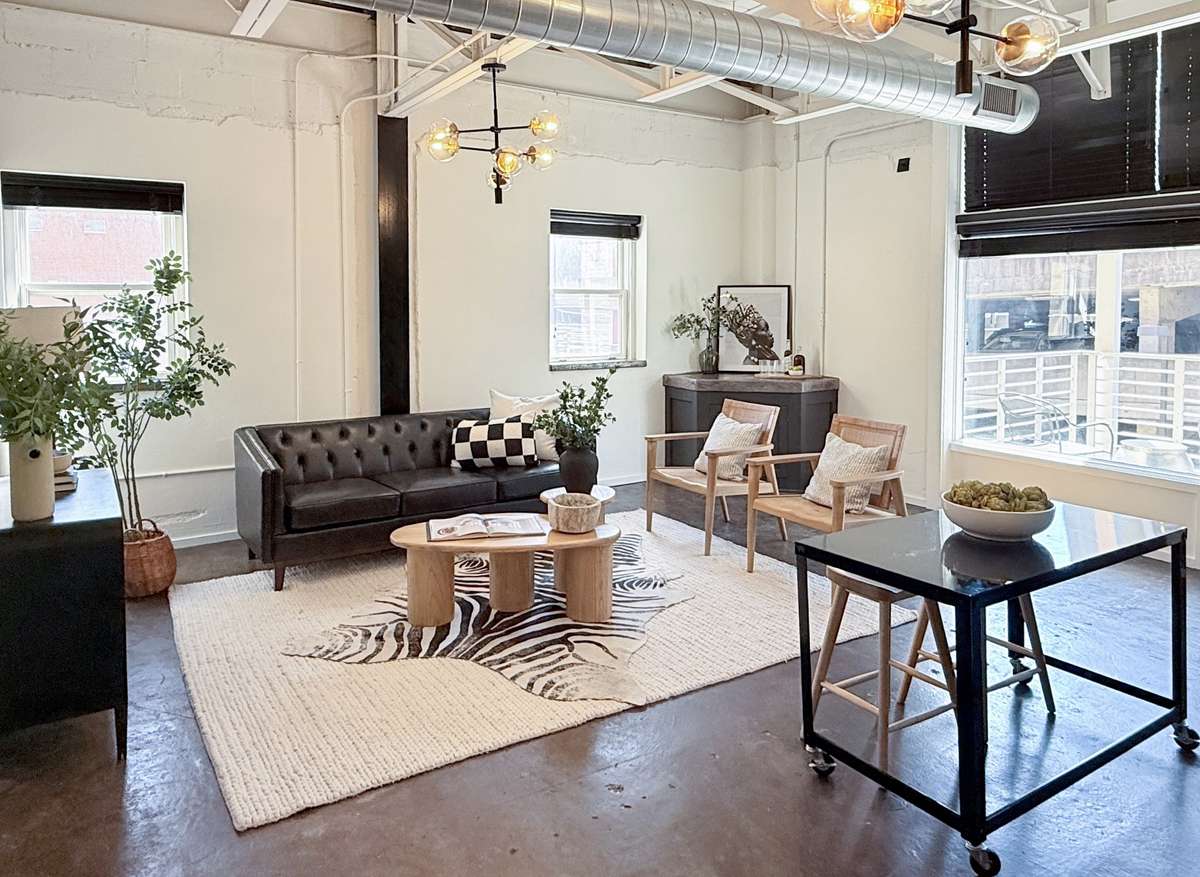 Soaring ceilings, natural light, concrete floors and open-concept loft living.