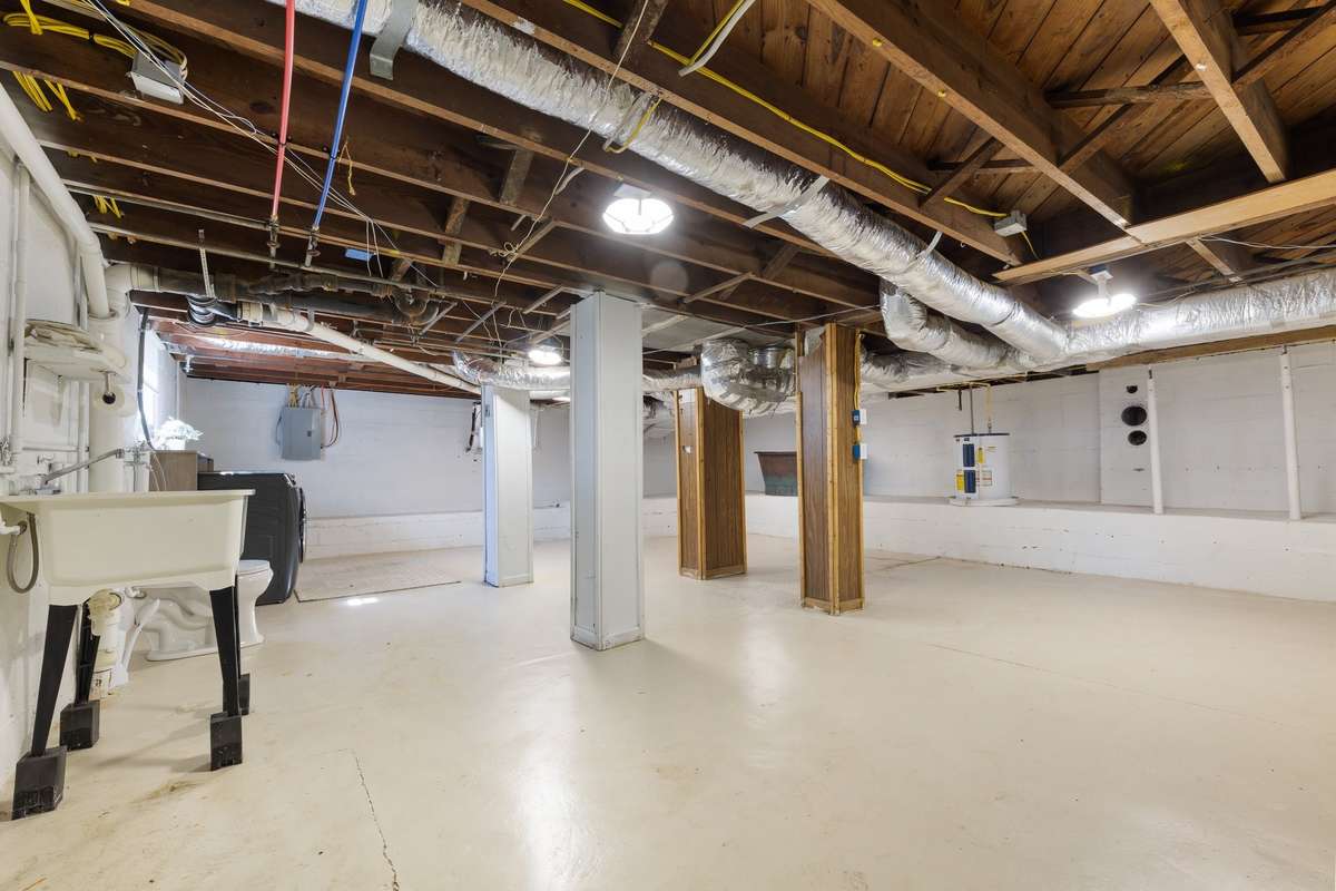 Working on a messy project, the basement offers a utility sink and working toilet (cough, a half bath), convenient for a quick break without needing to go upstairs.