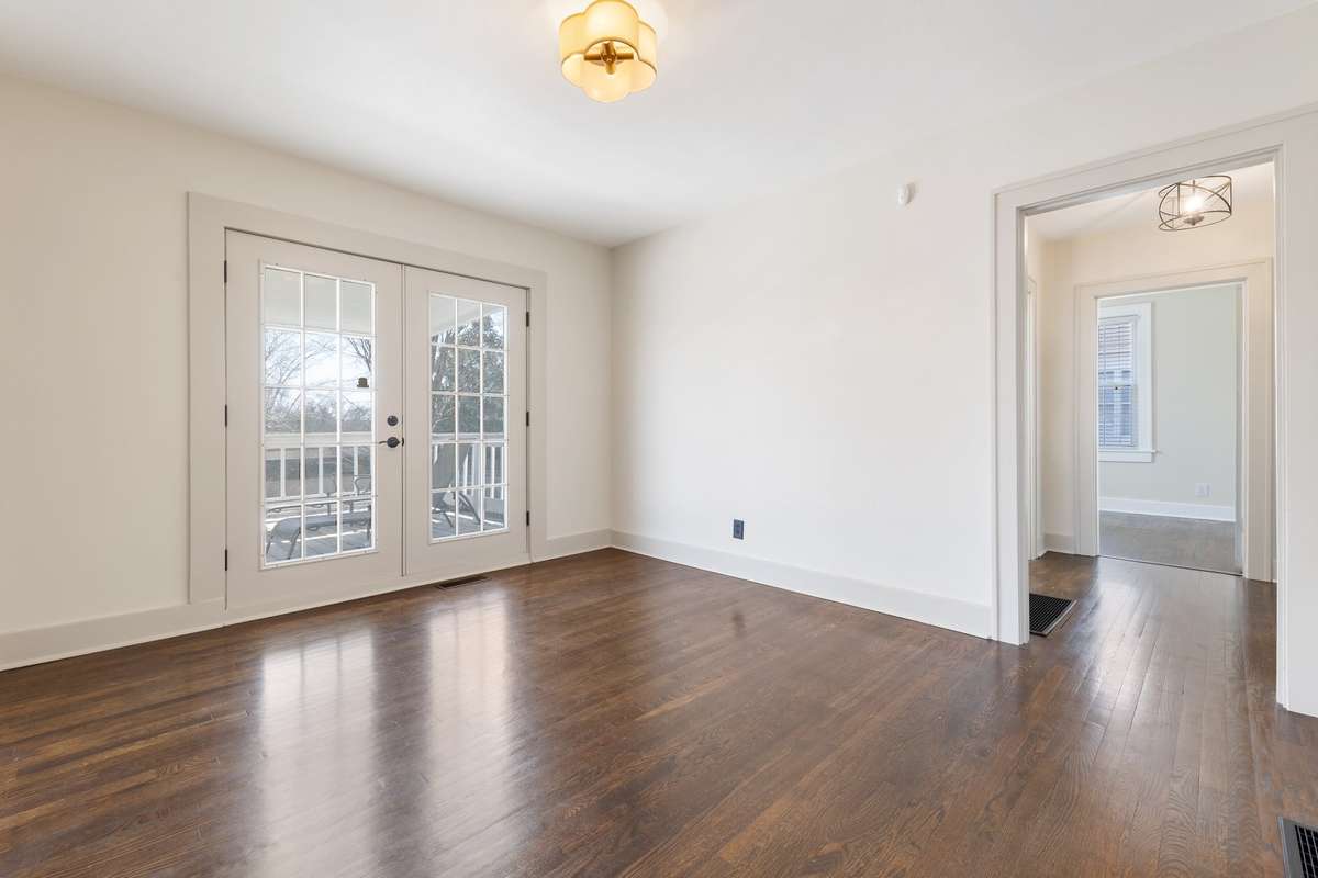 Flex room overlooking the backyard provides a perfect space for additional dining or relaxing sitting room.