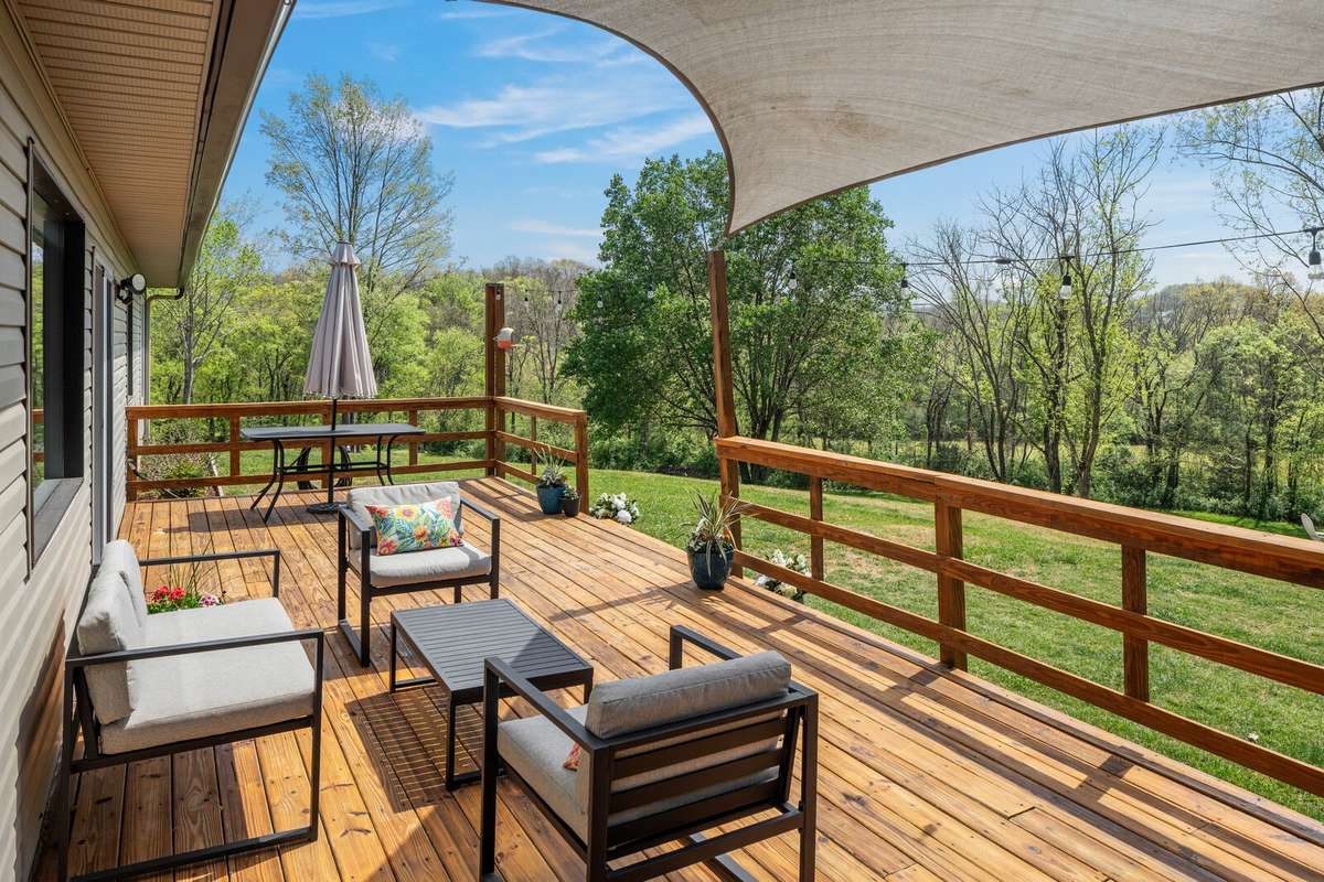 This deck is so spacious! Plenty of room for table and chairs & lounging furniture too!