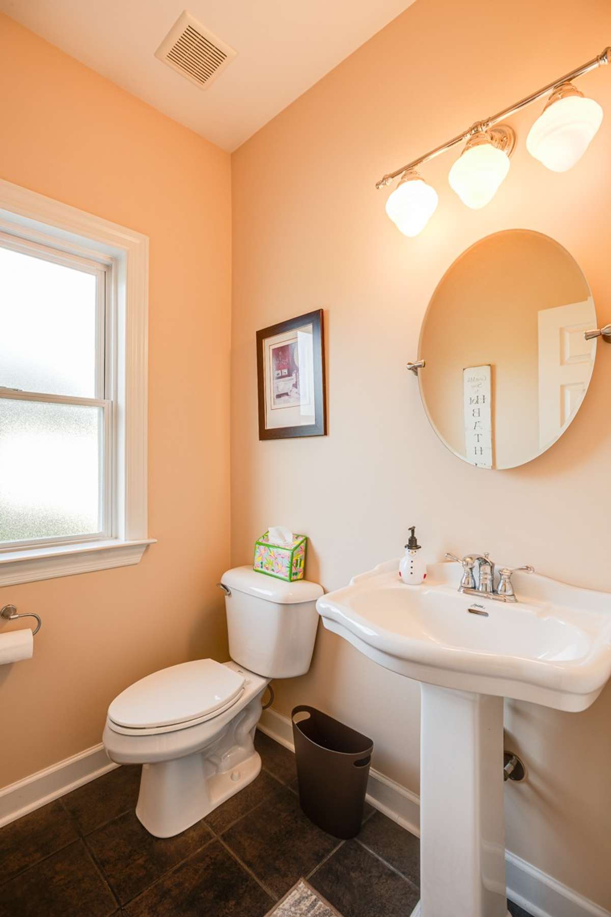 Half bath off kitchen and laundry room