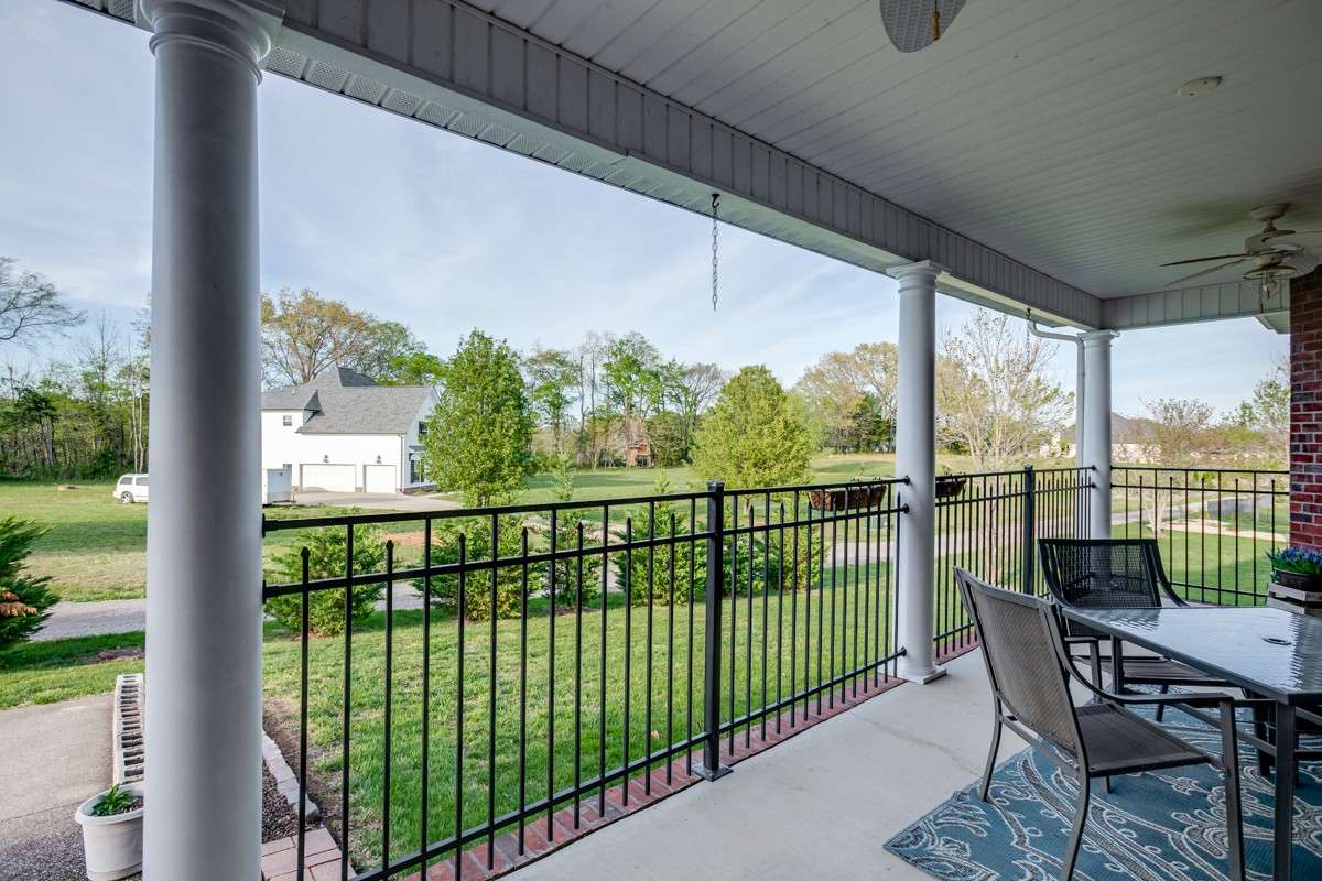Covered porch in back of home