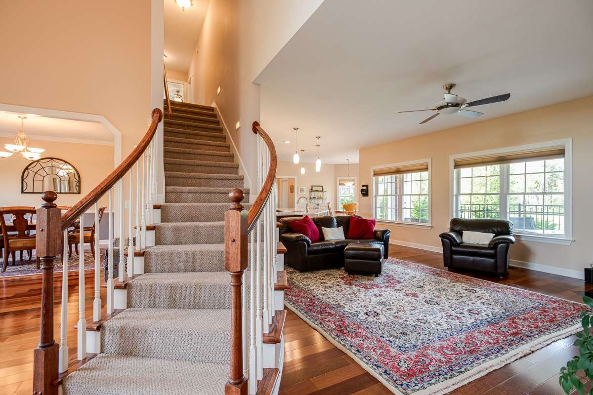 Curved staircase brings a distinguished air to the space