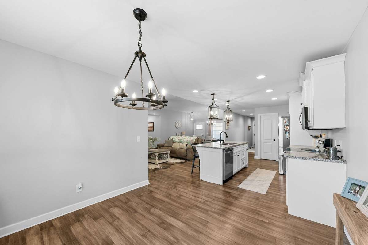 Eat in looking into kitchen and den