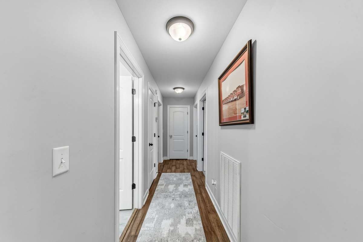 Hall to 3 more bedrooms the master on the other end!