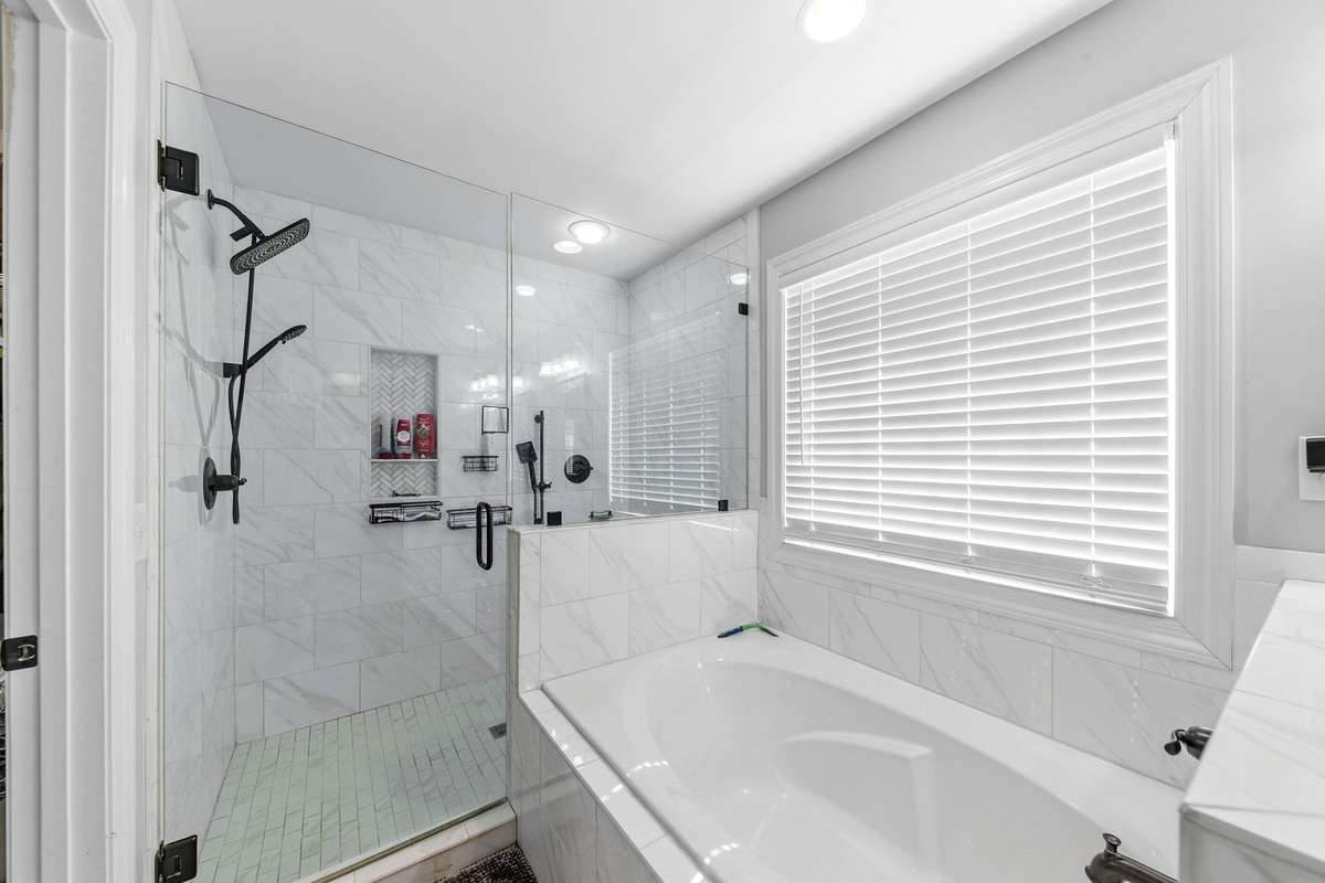 Master shower with a tub