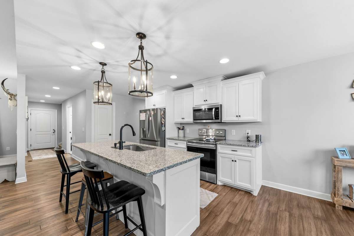 Kitchen to hall to laundry and garage