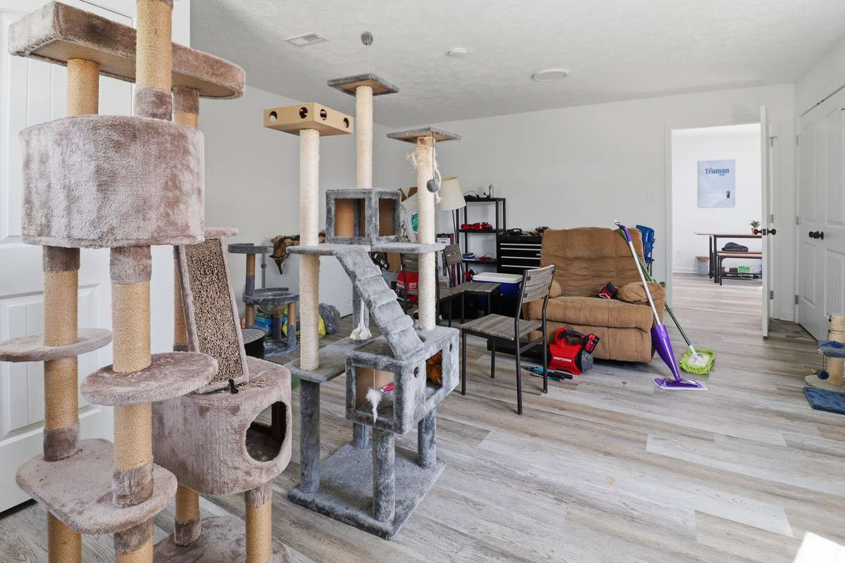 Large 3rd bedroom currently being used as storage but has access to the back patio so could make a great office or hobby room.