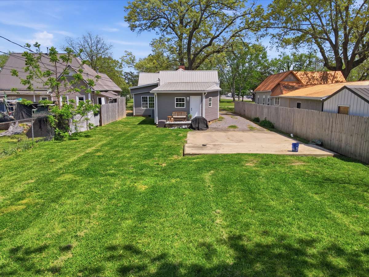 Large parking pad in the back of the house.
