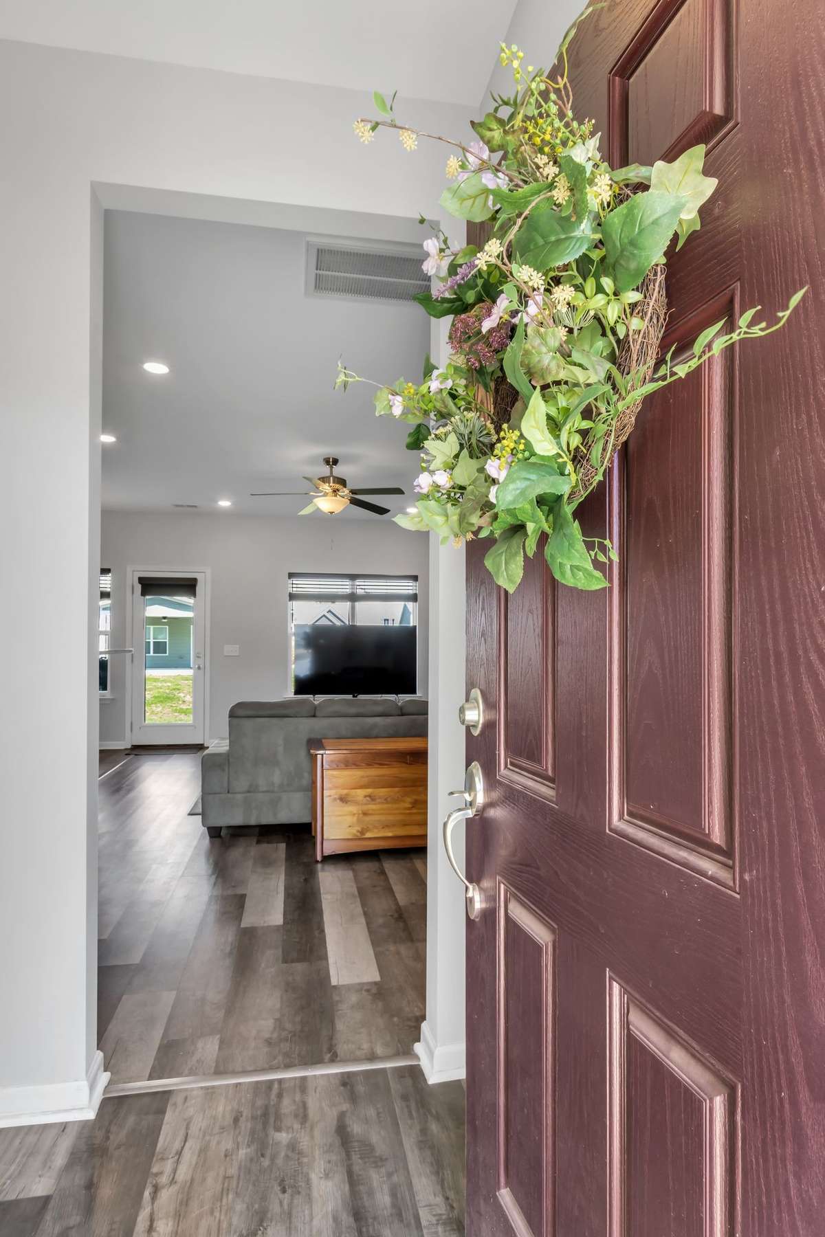 Step through the front door into the foyer — the great room lies just ahead.