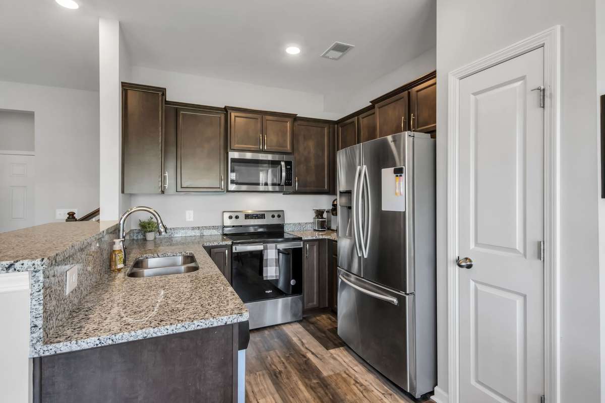 Rich, warm tones, stainless steel appliances, granite counters - Refrigerator remains!