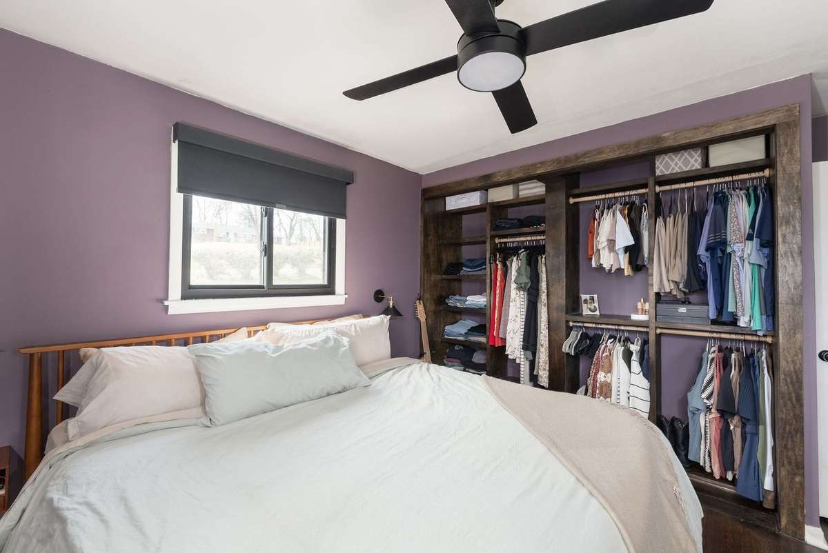 This closet system is newly installed and reinforced to support barn doors should one choose
