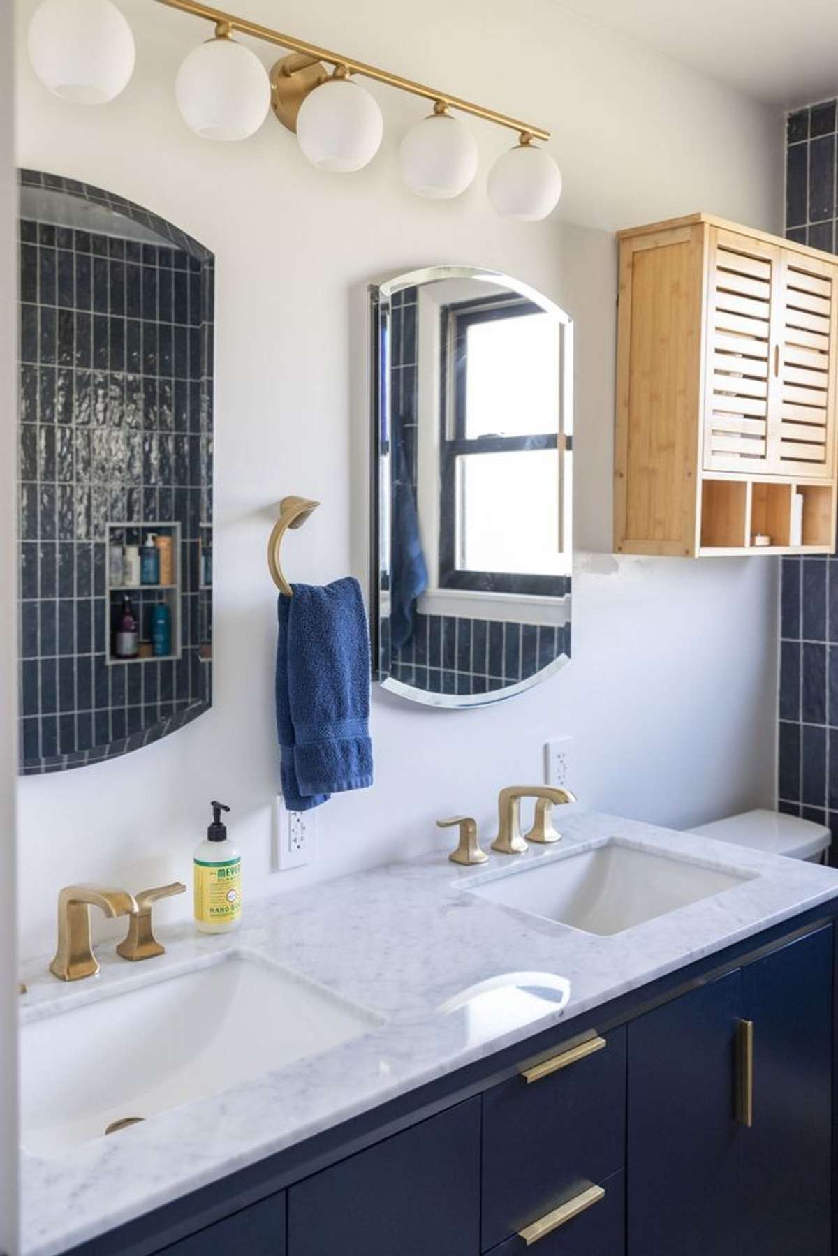 Newly renovated bathroom with designer tile