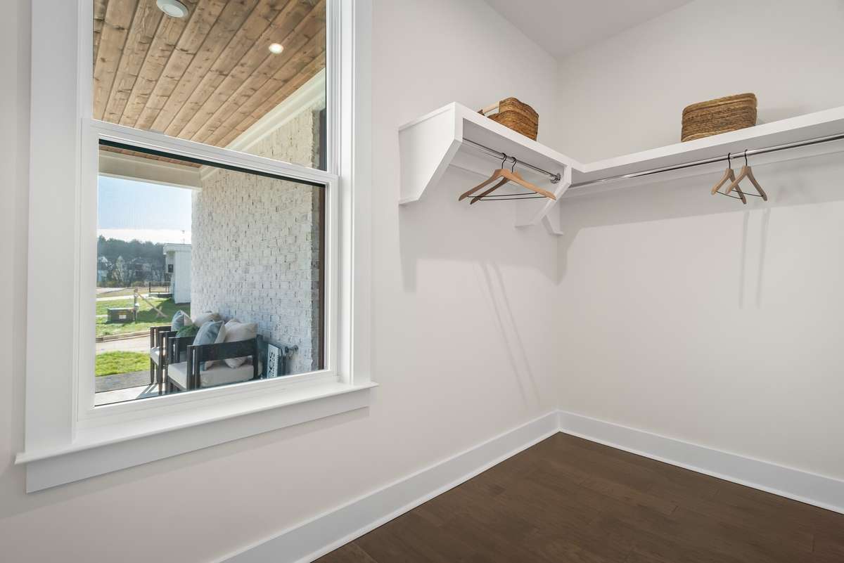Photos shown are of a model home and are for illustrative purposes only. The actual home will vary in finishes, materials, colors, options, and upgrades. Buyers should verify all features and selections prior to purchase.