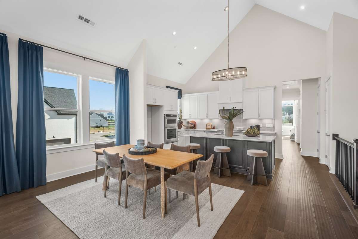 Photos shown are of a model home and are for illustrative purposes only. The actual home will vary in finishes, materials, colors, options, and upgrades. Buyers should verify all features and selections prior to purchase.
